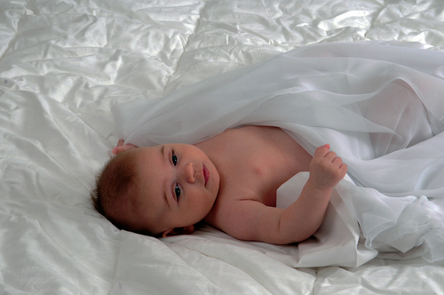 Baby in white tulle